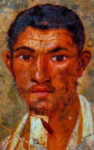 Pompei: Dalla “casa di Pansa”, particolare del ritratto di Paquio Proculo, conservato presso il Museo archeologico nazionale di Napoli. Di origini plebee, il “panettiere” divenne duoviro della città e uno dei rappresentanti più
influenti della sua borghesia commerciale. - Archivio BPP