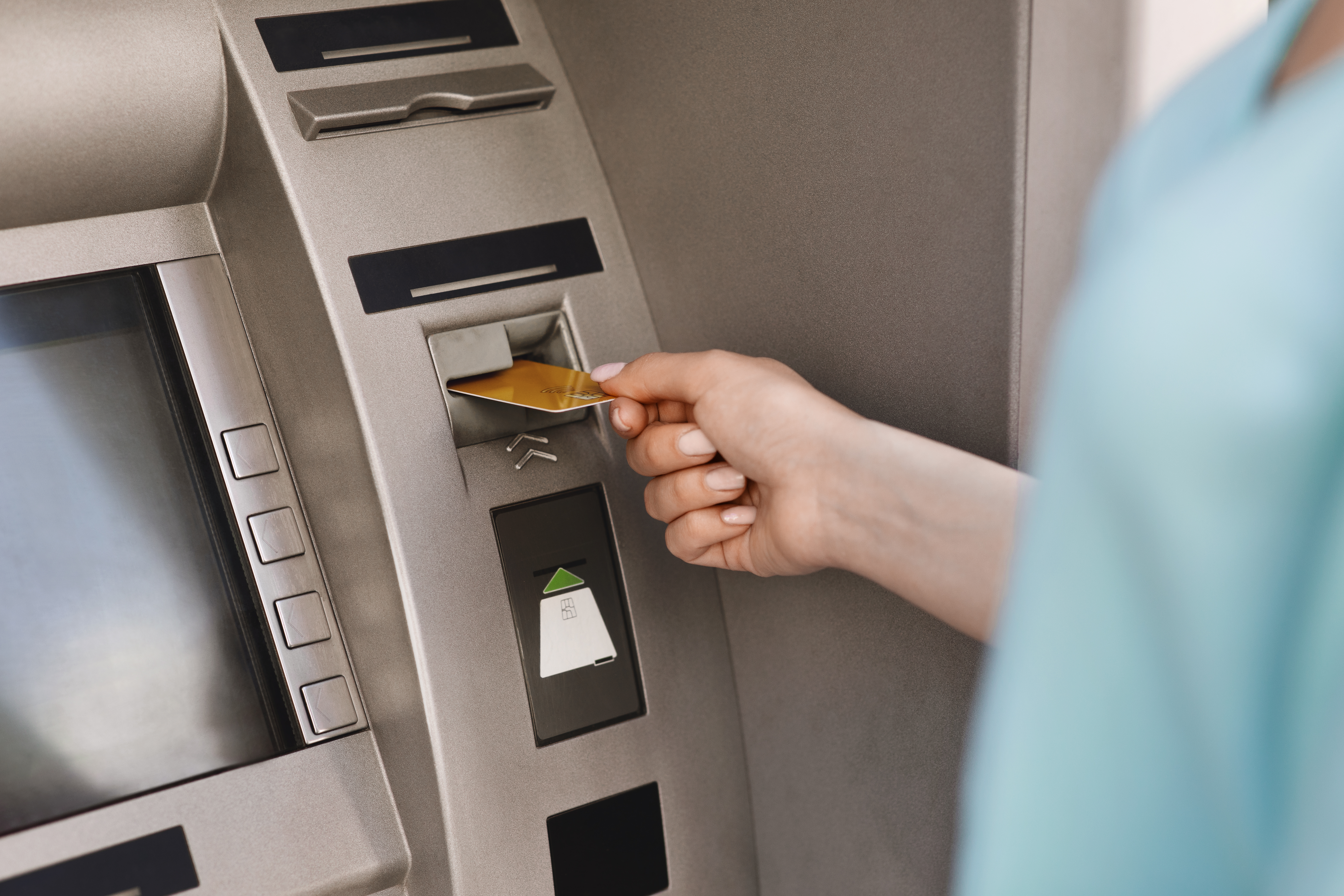 close-up-of-female-hand-inserting-credit-card-in-t-5W3RYM7 close-up-of-female-hand-inserting-credit-card-in-t-5W3RYM7